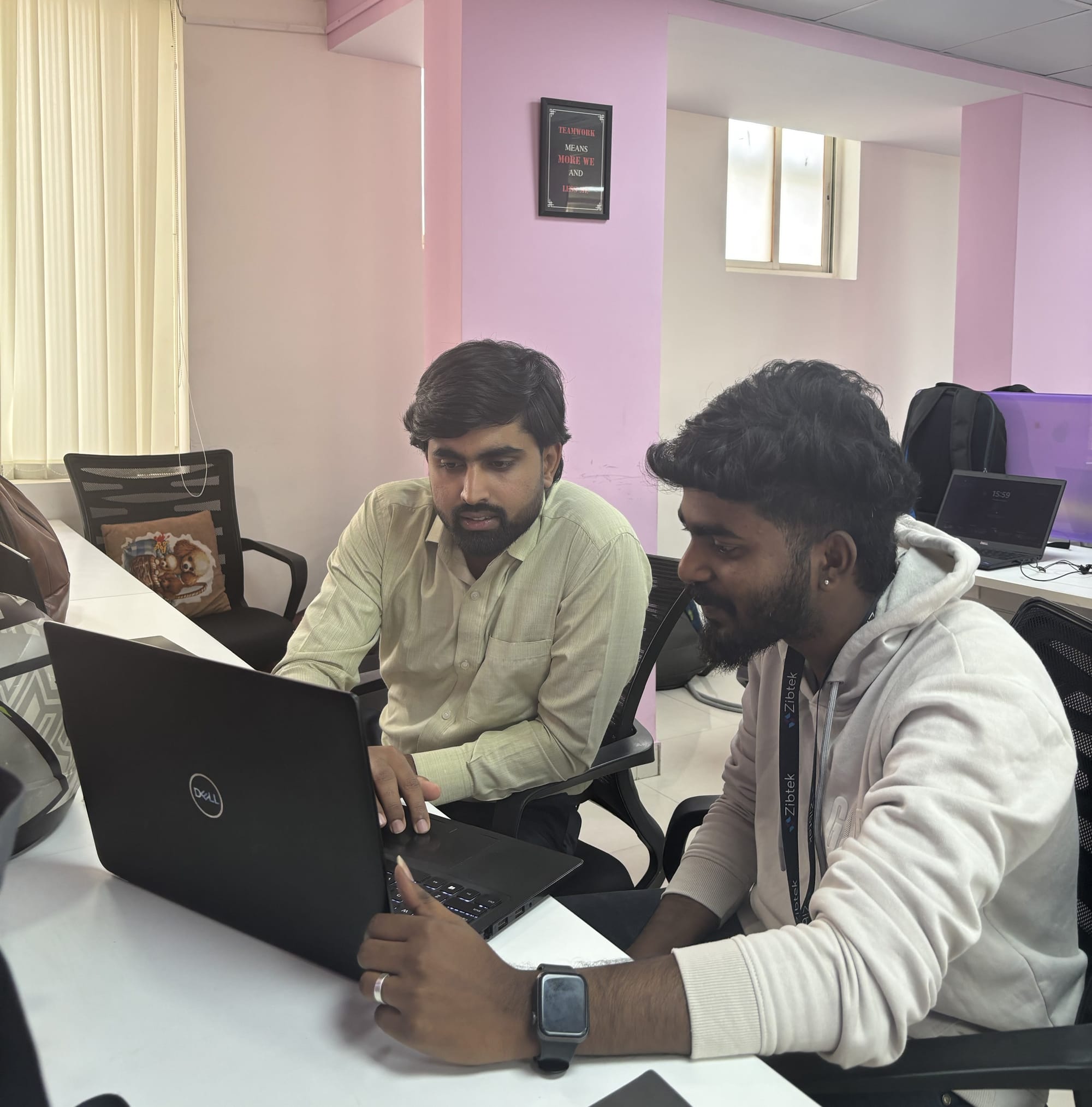 Zibtek Employees working on projects.